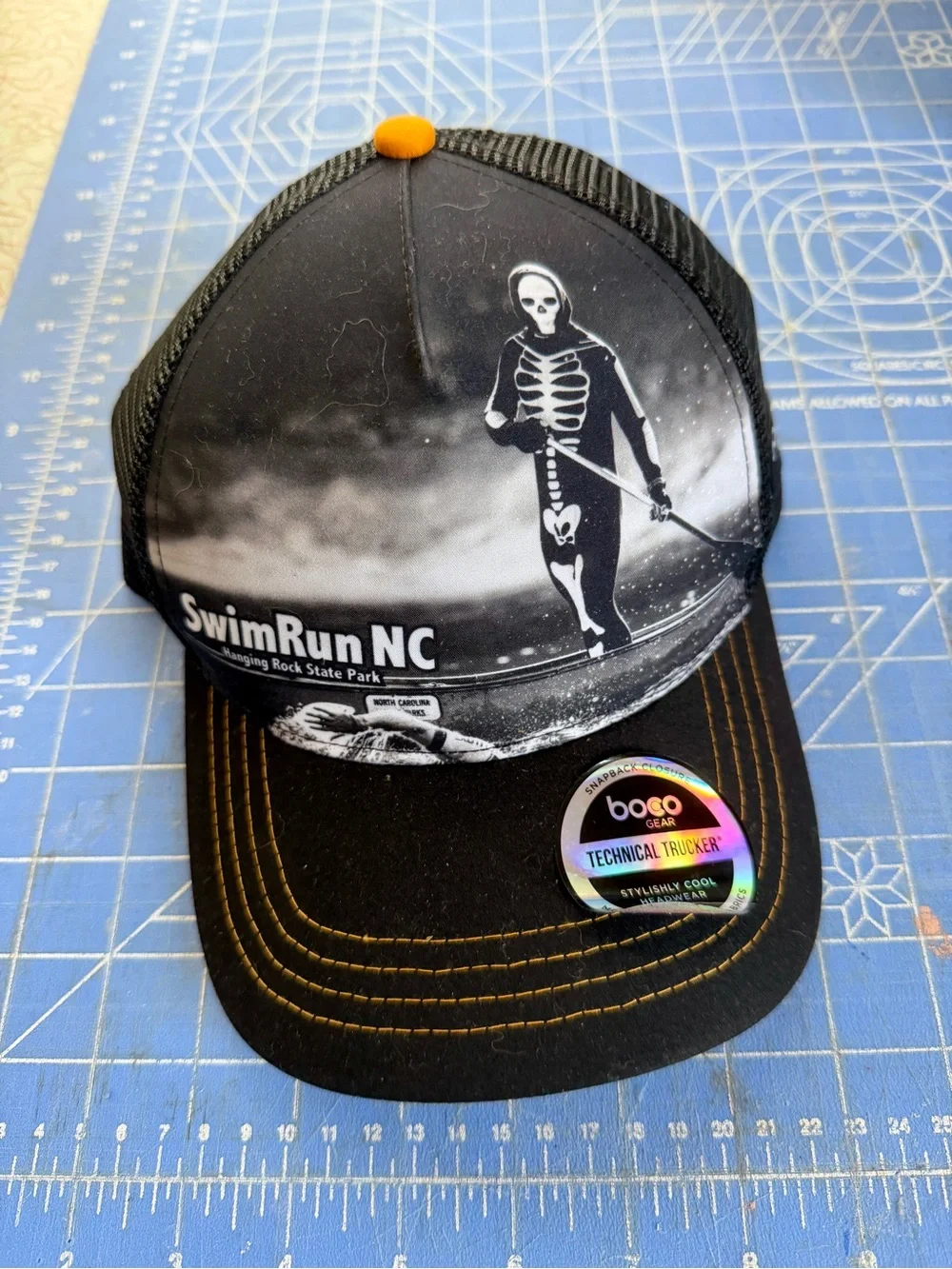 Boco Gear black and white SwimRun NC Skeleton Trucker Hat